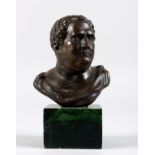 A SMALL BRONZE ROMAN STYLE BUST OF A MAN. 5.5ins high.