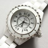 A CHANEL WHITE WRISTWATCH, No. DE 21011.