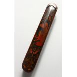 A SMALL PERSIAN LACQUER PEN BOX. 7ins long.