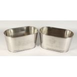 A PAIR OF SMALL PLATED OVAL WINE COOLERS. 13.5ins long.