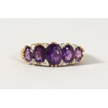 A SILVER AND GOLD PLATED AMETHYST AND DIAMOND RING.