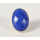 A SILVER AND LAPIS RING.