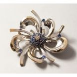 AN 18CT WHITE GOLD, DIAMOND AND SAPPHIRE BROOCH.