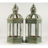 A PAIR OF HEXAGONAL METAL LANTERNS. 24ins high.