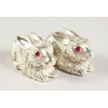 A PAIR OF .925 SILVER PLATE RABBIT SALT AND PEPPER.