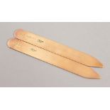 A PAIR OF ASPREYS 9CT GOLD COLLAR STIFFENERS in a leather case.