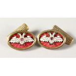 A PAIR OF RUSSIAN OVAL CUFFLINKS.