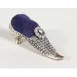 A CAST SILVER VICTORIAN SHOE PIN CUSHION.