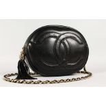 A GOOD CHANEL PADDED BLACK LEATHER BAG with entwined CC, 9.5ins wide, with long leather and gilt