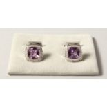A VERY GOOD PAIR OF 18CT WHITE GOLD AMETHYST AND DIAMOND SET CUFFLINKS. 16.5 grams.