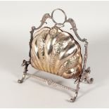 A FOLDING PLATE CHEESE AND BISCUIT STAND with repousse decoration.