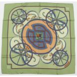 A HERMES SILK SCARF "WASHINGTON CARRIAGE". 68ins x 68ins, in an orange Hermes box.