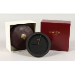 A SWIZA RITZ CLUB CLOCK in leather pouch and box.
