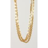 A CHANEL GOLD PLATED PEARL CC LONG CHAIN NECKLACE, in Chanel box.
