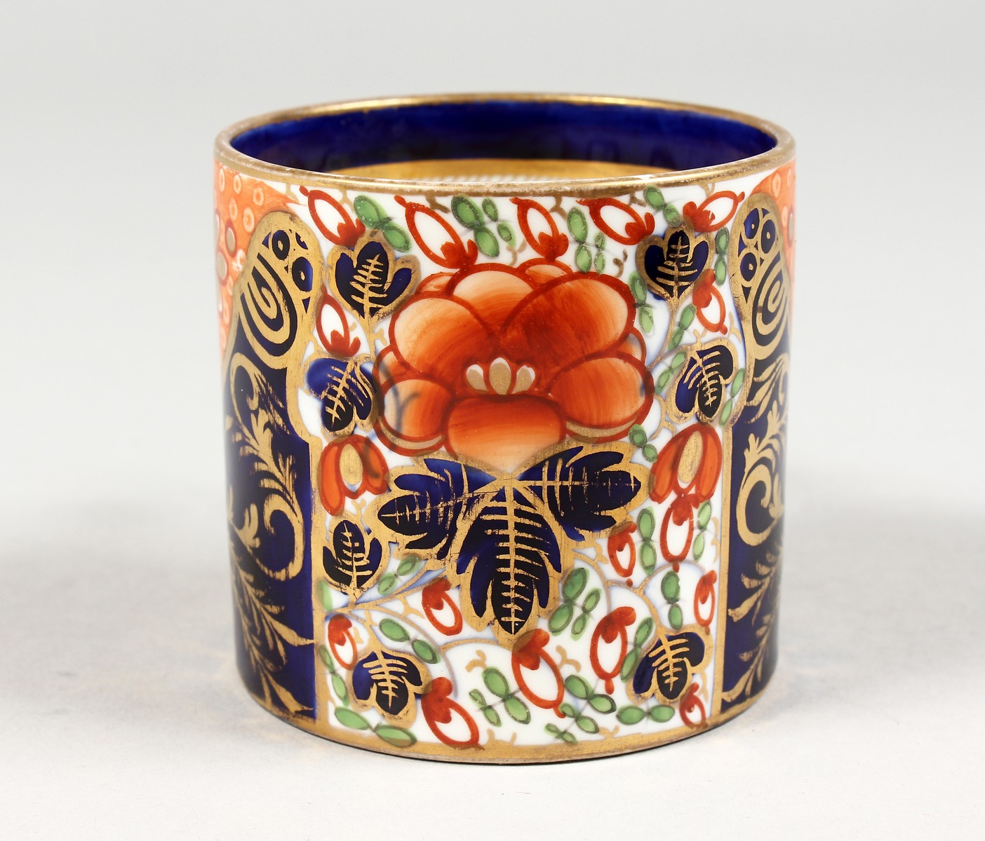 AN EARLY 19TH CENTURY DERBY COFFEE CAN painted with an Imari style pattern, red mark.