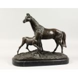 AFTER P. J. MENE. A GOOD BRONZE MARE AND FOAL. Signed, on a marble base. 15ins long.