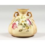 A ROYAL WORCESTER BLUSH IVORY TWO HANDLED VASE painted with roses and lilies, date code 1914,