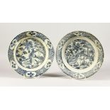 TWO CHINESE WANLI PERIOD BLUE AND WHITE PEACOCK DESIGN PLATES. 11ins diameter.