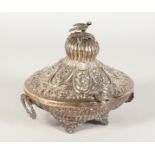 A GOOD ISLAMIC SILVER OVAL BOX AND COVER with repousse decoration, handles and bird surmount. 6ins