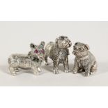 THREE CAST SILVER DOGS.