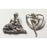 TWO SILVER ART DECO DESIGN LADY AND DOG BROOCHES.