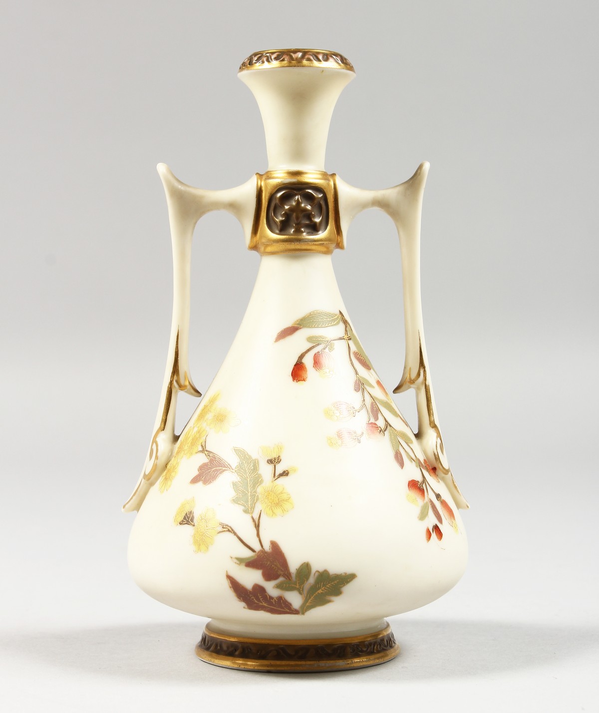 A ROYAL WORCESTER IVORY TWO HANDLED VASE painted with roses highlighted with gilding, date blue mark