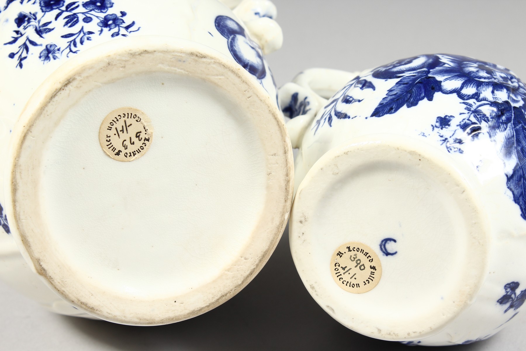 A GRADUATED PAIR OF DECORATIVE ENGLISH PORCELAIN MASK JUGS printed with fir cones and roses in - Image 7 of 9