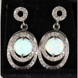 A PAIR OF SILVER AND OPAL DECO DESIGN DROP EARRINGS.