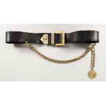 A GOOD CHANEL BLACK LEATHER AND GILT BELT to fit a 71-75cm waist