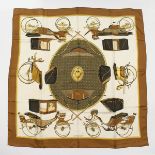 A HERMES SILK SCARF "LES VOITURES A TRANSFORMATION". 32ins x 32ins.