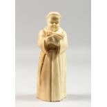 A ROYAL WORCESTER CANDLE SNUFFER OF A MONK in uncommon blush ivory, date code 1905.