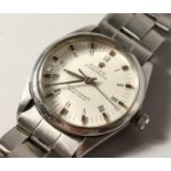 A ROLEX OYSTER PERPETUAL STAINLESS STEEL WRISTWATCH AND BRACELET.