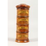 A FOUR-TIER WOOD SPICE TOWER, Cloves, Ginger, Mace and Nutmeg. 7.5ins high.