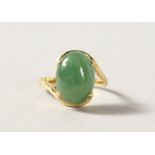 AN 18CT GOLD JADE RING.