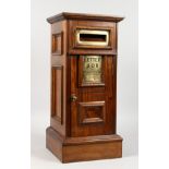 A GOOD SQUARE MAHOGANY LETTER BOX, with letter box and door. 20ins high.
