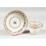 AN 18TH CENTURY WORCESTER TYPE SPIRALLY MOULDED COFFEE CUP AND SAUCER, a continuous band of