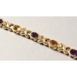 A 14CT GOLD, AMETHYST AND CITRINE BRACELET.