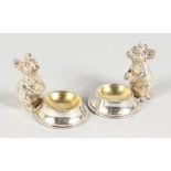 A GOOD PAIR OF SILVER PLATE MICE SALTS.