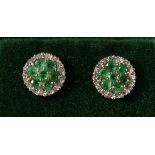 A PAIR OF 9CT GOLD, EMERALD AND DIAMOND CLUSTER EARRINGS.