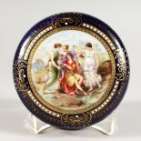 A VICTORIAN BLUE CIRCULAR POWDER BOWL AND COVER, the lid with classical figures. 5ins diameter.
