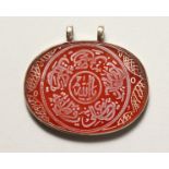 AN EGYPTIAN OVAL PENDANT.