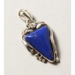 A SILVER AND LAPIS PENDANT.