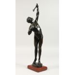 H. GLADENBECK & SOHN (BERLIN) A STANDING NUDE holding a bow. Signed. 14ins high, on a marble base.