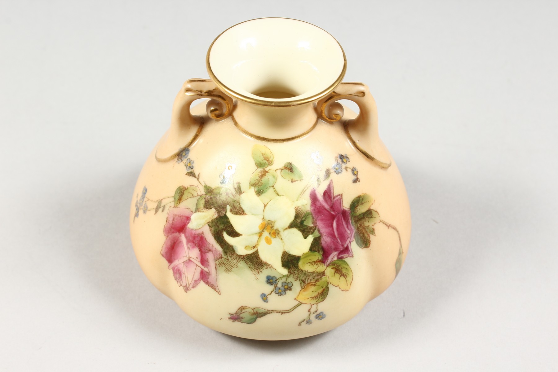 A ROYAL WORCESTER BLUSH IVORY TWO HANDLED VASE painted with roses and lilies, date code 1914, - Image 2 of 5