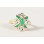 A 14CT GOLD, EMERALD AND DIAMOND RING.