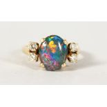 A 14CT GOLD, BLACK OPAL AND DIAMOND RING.