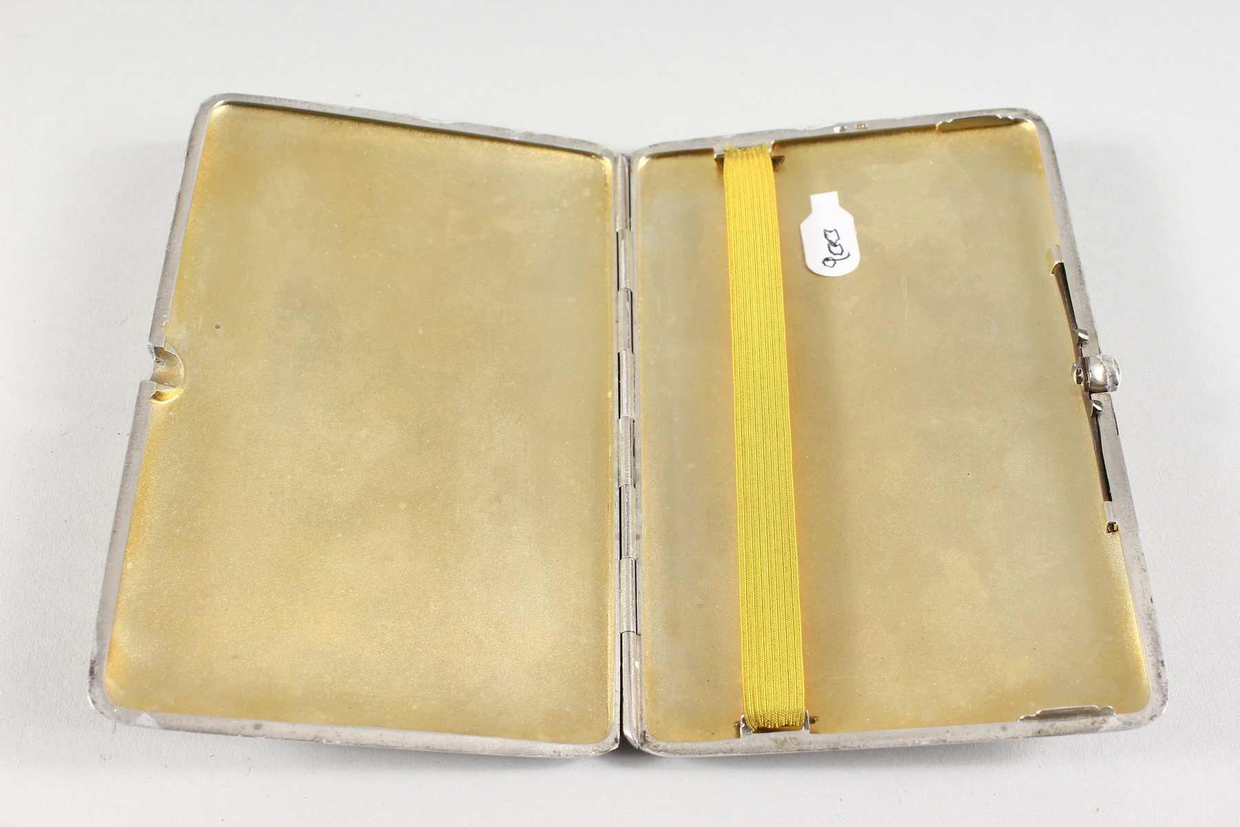 AN ENGINE TURNED SILVER CIGARETTE CASE, with an oval of a model with a fur coat. - Image 3 of 4