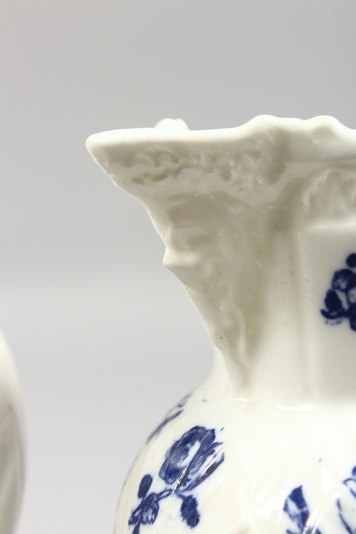 A GRADUATED PAIR OF DECORATIVE ENGLISH PORCELAIN MASK JUGS printed with fir cones and roses in - Image 4 of 9