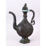 A 19TH CENTURY OR EARLIER ISLAMIC PERSIAN MOULDED BRONZE EWER, with a mythical beast finial to the