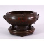 A FINE 19TH CENTURY CHINESE INLAID BRONZE CENSER & STAND, the censer in the form of a squash barrel,